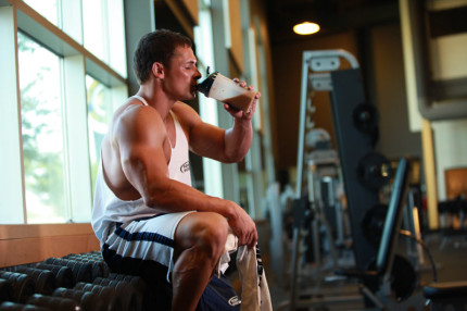 man drinking a post workout